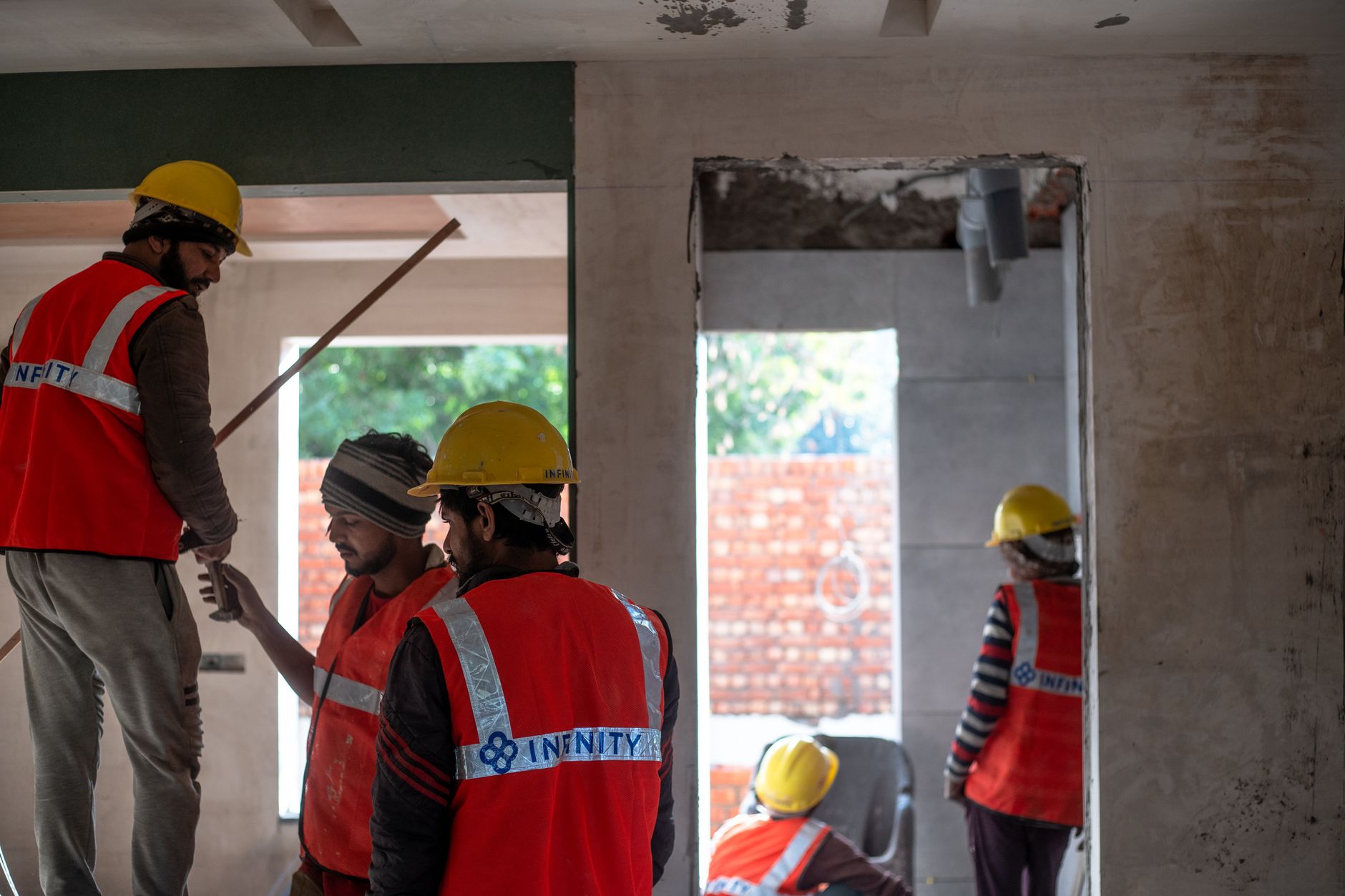 Construction and infrastructure workers on a large greenfield site